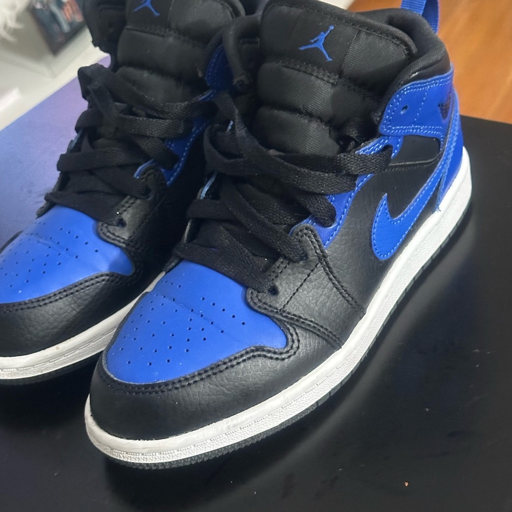 Air Jordan 1 Mid Black and Blue Sneakers